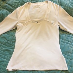 NIKE Dri-Fit women’s 3-quarter sleeve top.